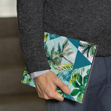 A business man holds Personalized VistaCase reMarkable Pen Holder Case with Tropical Leaves design