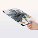 a hand is holding the Personalized Samsung Galaxy Tab Case with Artistic Flower design