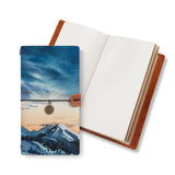 opened midori style traveler's notebook with Landscape design