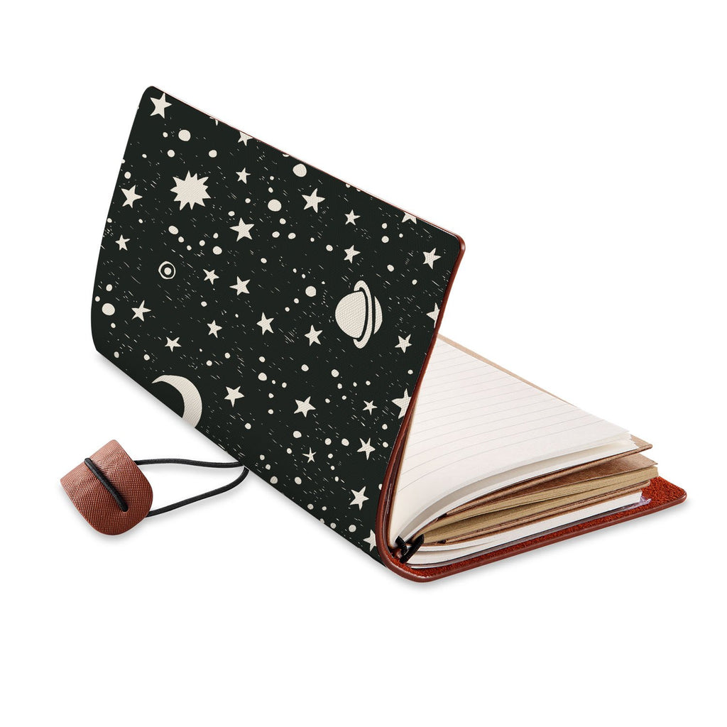 opened view of midori style traveler's notebook with Space design
