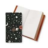 opened midori style traveler's notebook with Space design