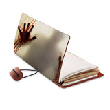 opened view of midori style traveler's notebook with Horror design