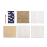 midori style traveler's notebook with Feather design, refills and accessories