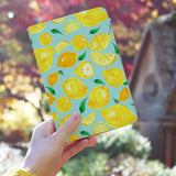 a girl holding personalized RFID blocking passport travel wallet with Fruit design