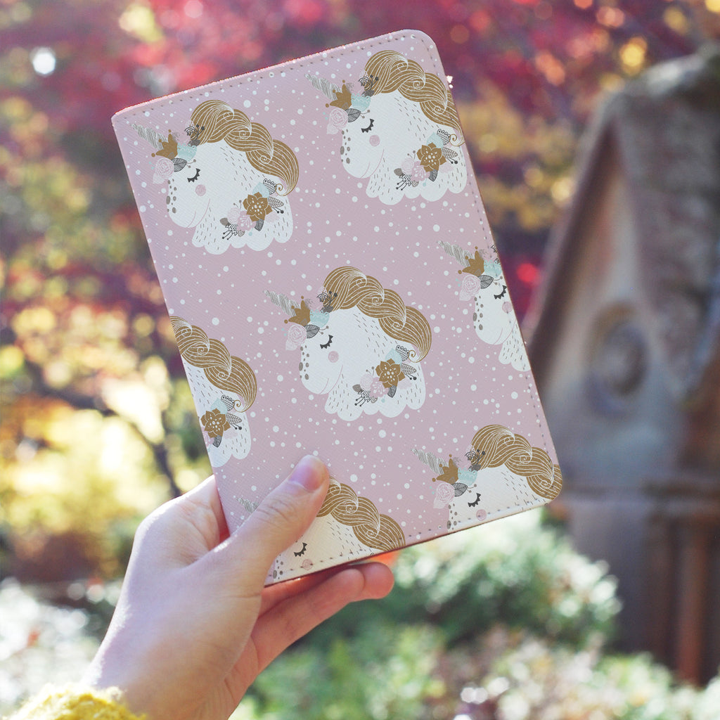 a girl holding personalized RFID blocking passport travel wallet with Flower Unicorn design