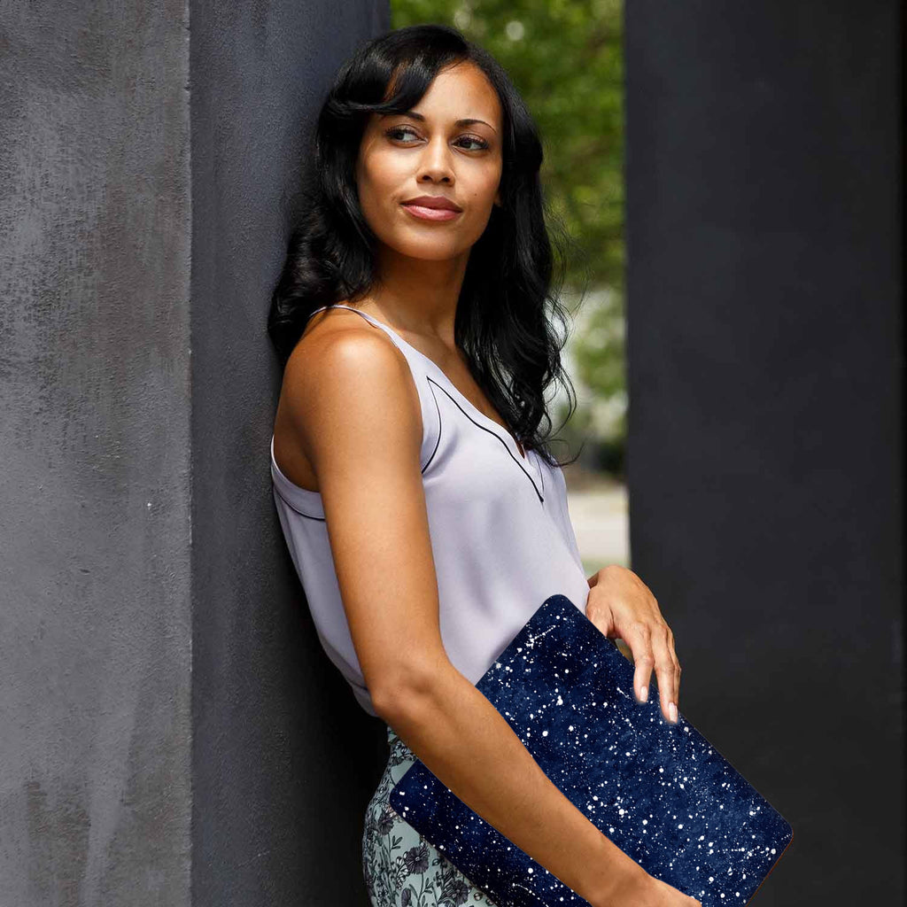 A yong girl holding personalized microsoft surface laptop case with Galaxy Universe design