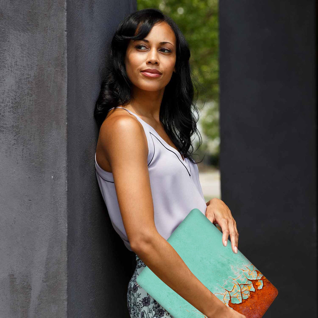 A yong girl holding personalized microsoft surface laptop case with Rusted Metal design