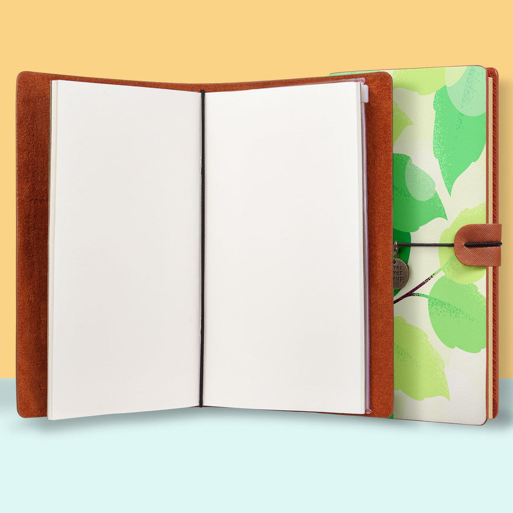 the front top view of midori style traveler's notebook with Leaves design