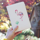 a girl holding personalized RFID blocking passport travel wallet with Tropical Treasures design