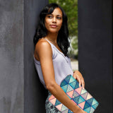 A yong girl holding personalized microsoft surface laptop case with Aztec Tribal design