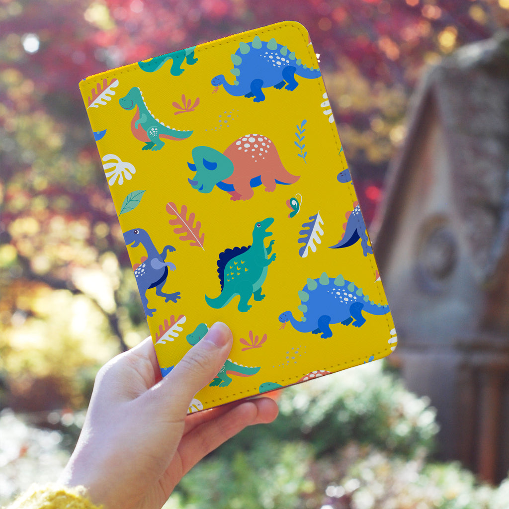 a girl holding personalized RFID blocking passport travel wallet with Dinosour design