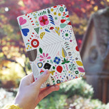 a girl holding personalized RFID blocking passport travel wallet with Geometric Floral Patterns design