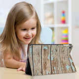 Enjoy the videos or books on a movie stand mode with the personalized iPad folio case with Wood design