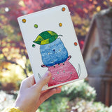 a girl holding personalized RFID blocking passport travel wallet with Cute Monster design