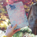 a girl holding personalized RFID blocking passport travel wallet with Oil Painting Abstract design