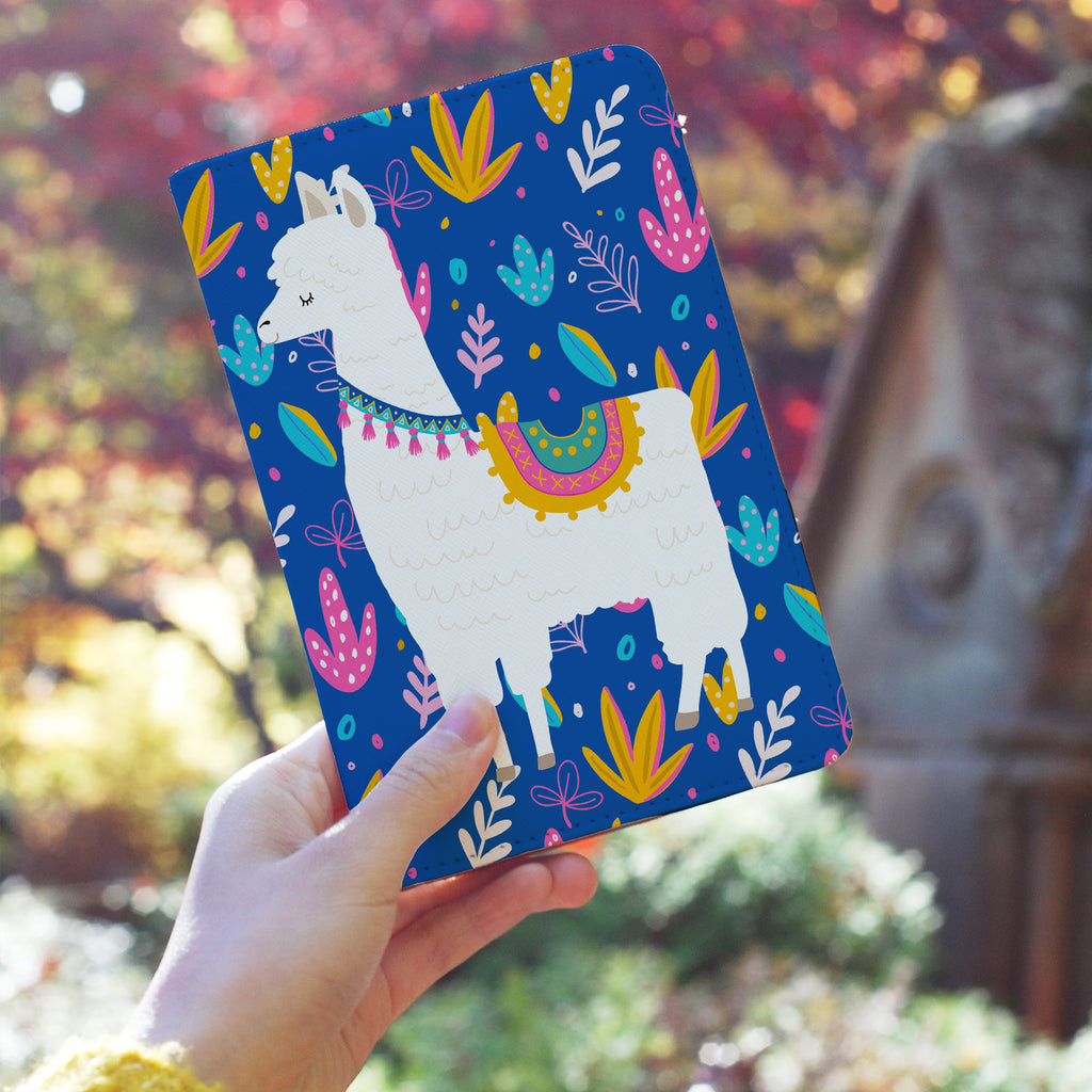 a girl holding personalized RFID blocking passport travel wallet with Llamas design