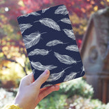 a girl holding personalized RFID blocking passport travel wallet with Feather design