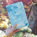 a girl holding personalized RFID blocking passport travel wallet with Winter design