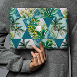 Form-fitting hardshell with Tropical Leaves design keeps scuffs and scratches at bay