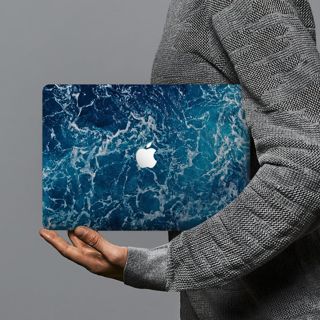 hardshell case with Ocean design combines a sleek hardshell design with vibrant colors for stylish protection against scratches, dents, and bumps for your Macbook